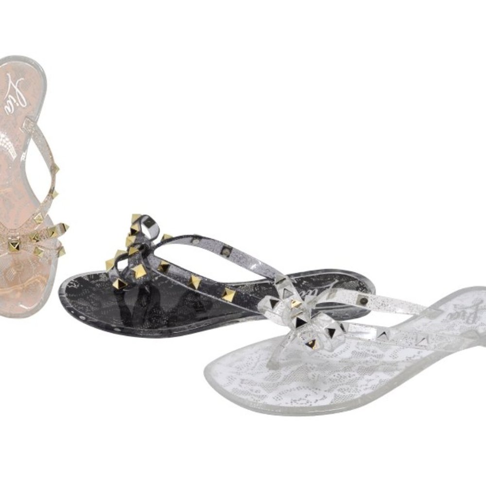 Studed bow jelly sandals with studs. PINK